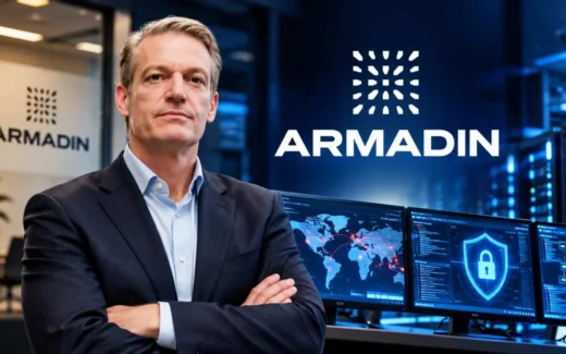 Kevin Mandia, pendiri dan CEO Armadin, dengan latar visual keamanan siber dan identitas perusahaan Armadin.
